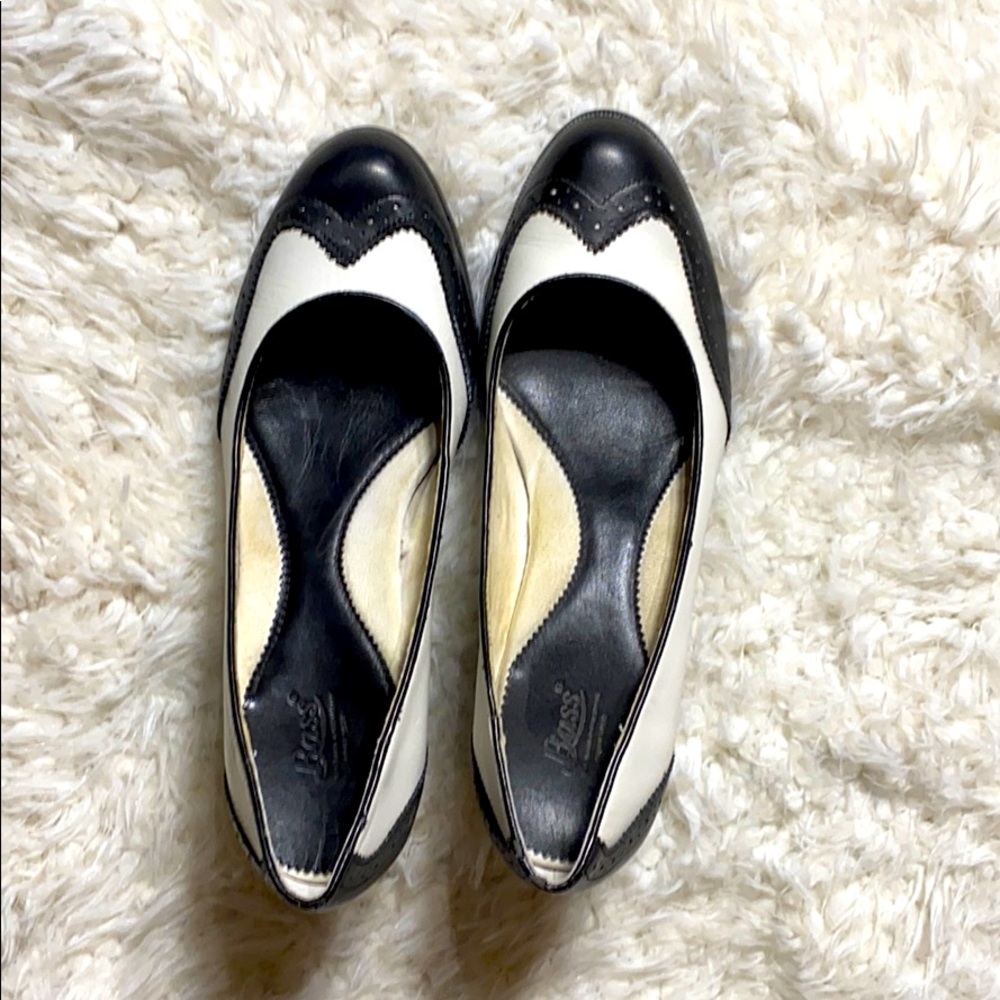 Black and white wing tip heels